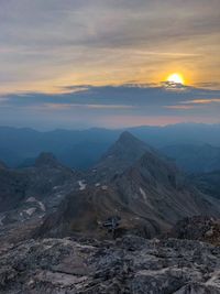 Scenic view of mountains against sky during sunset