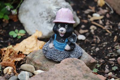 High angle view of stuffed toy on rock