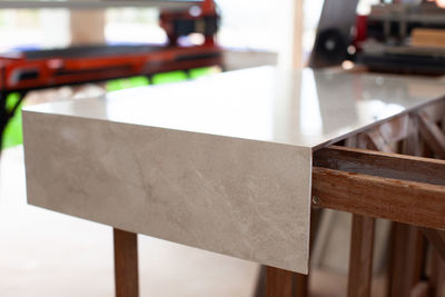 Close-up of empty seats on table in cafe