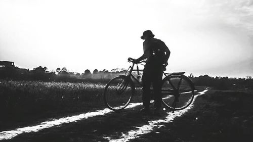 Side view of a men against sky