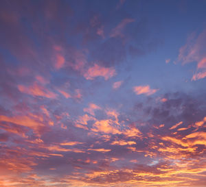 Low angle view of dramatic sky during sunset