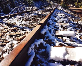 Rocks on snow covered landscape