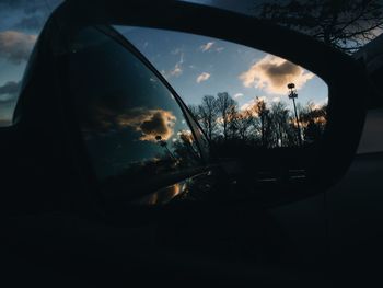 Reflection of car on side-view mirror