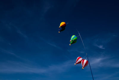 Low angle view of flag against sky