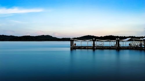 Scenic view of sea against blue sky