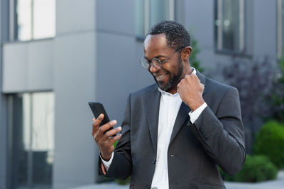 Young man using mobile phone