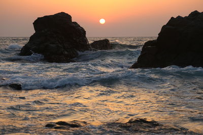 Scenic view of sea against sky during sunset