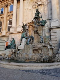 Low angle view of statues on building