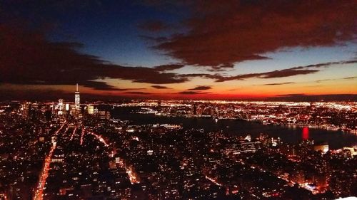 Aerial view of illuminated cityscape at night