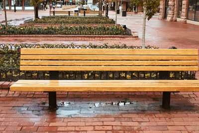 Empty bench in park