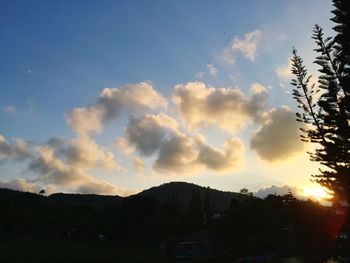 Scenic view of silhouette mountains against sky at sunset