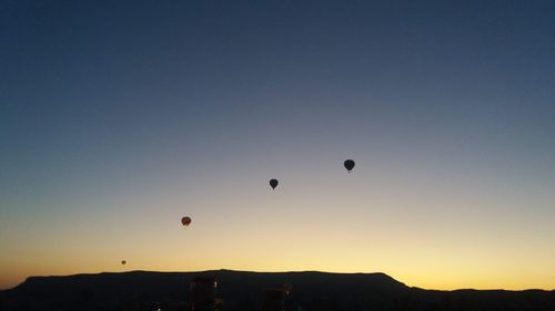 Hot air balloon in sky during sunset