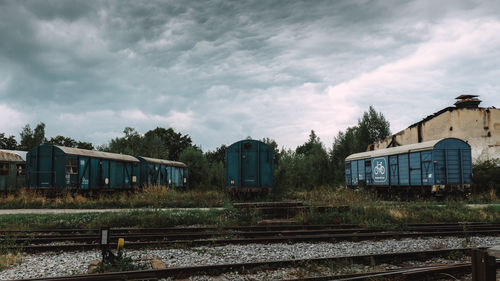 Train on railroad tracks against sky