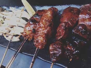 Close-up of serving on barbecue grill