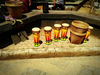 High angle view of bottles on table at street market