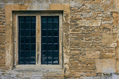 Closed window of old building