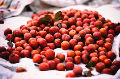 Plums for sale at market stall