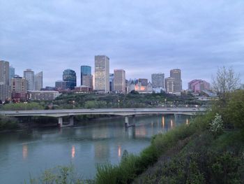 Buildings against sky with waterfront