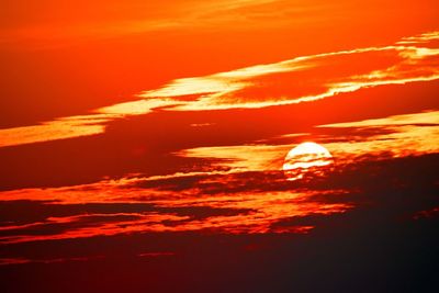Low angle view of dramatic sky during sunset