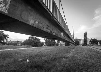 Bridge over city against sky