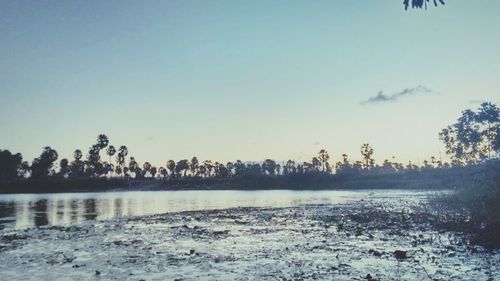 Scenic view of landscape against sky during sunset