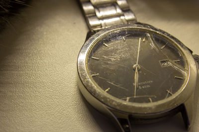 High angle view of clock on table