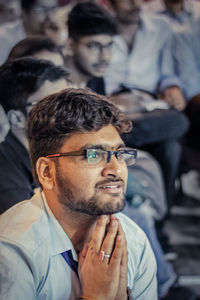 Portrait of young man with eyeglasses