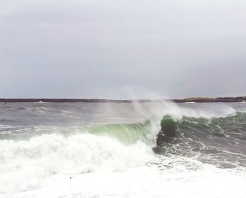 Waves splashing on rocks