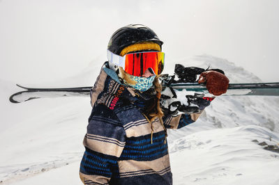 Young woman on a ski vacation in the mountains, portrait. great rider holiday in ski resort