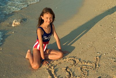 Portrait of happy girl on beach