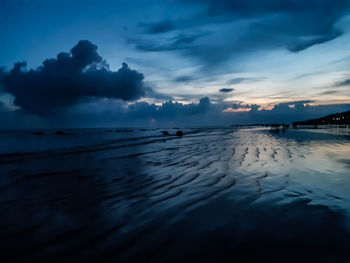 Scenic view of sea against sky at sunset