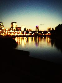Reflection of trees in water at night