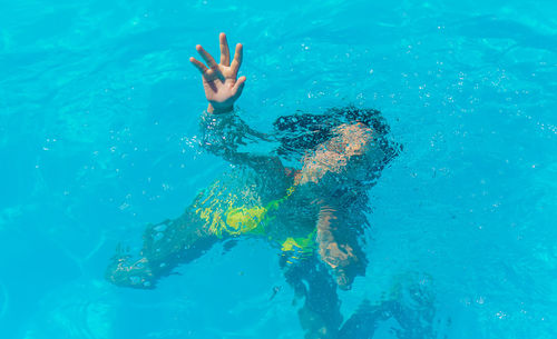 Man swimming in sea