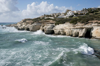 Scenic view of sea and cliff