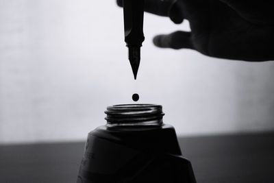 Close-up of ink drop out of pen