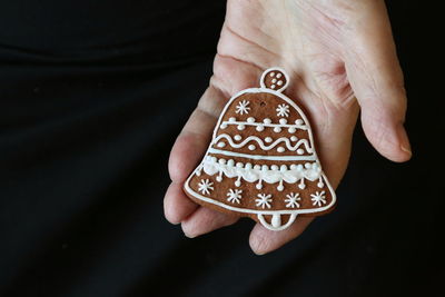 Close-up of hand holding cookie