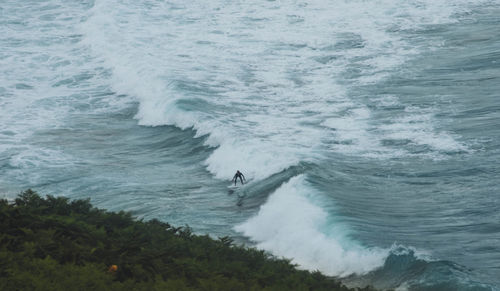 High angle view of waves in sea