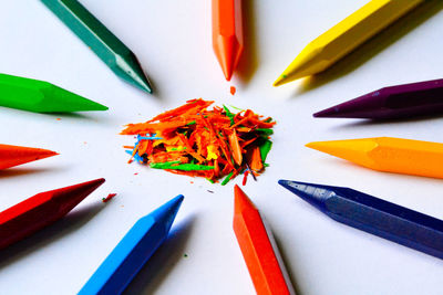 High angle view of colored pencils on table