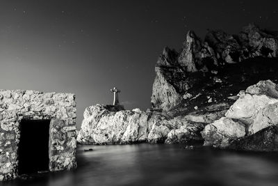 Rocks in water at night