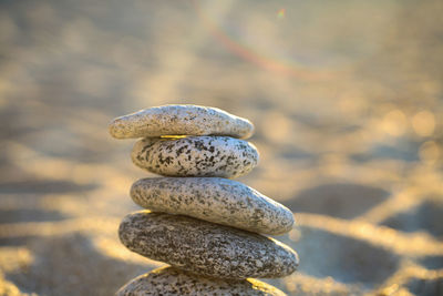 Close-up of stone stack on rock