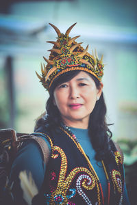 Portrait of young woman wearing hat