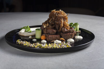 Close-up of food in plate on table