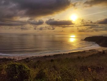 Scenic view of sea against sky during sunset