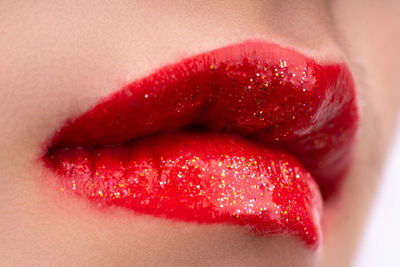 Close-up of woman with red lipstick