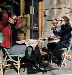 People sitting on table at cafe