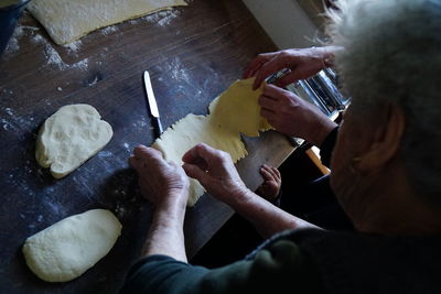 High angle view of woman preparing food