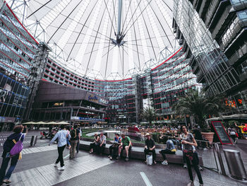 People walking in modern building