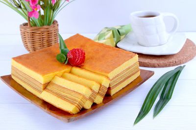 Close-up of fruits in basket on table