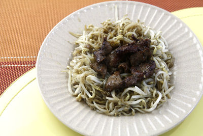 Close-up of noodles served in plate