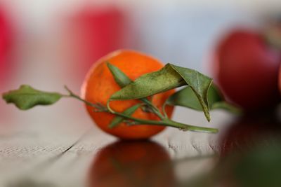 Close-up of orange fruit on table